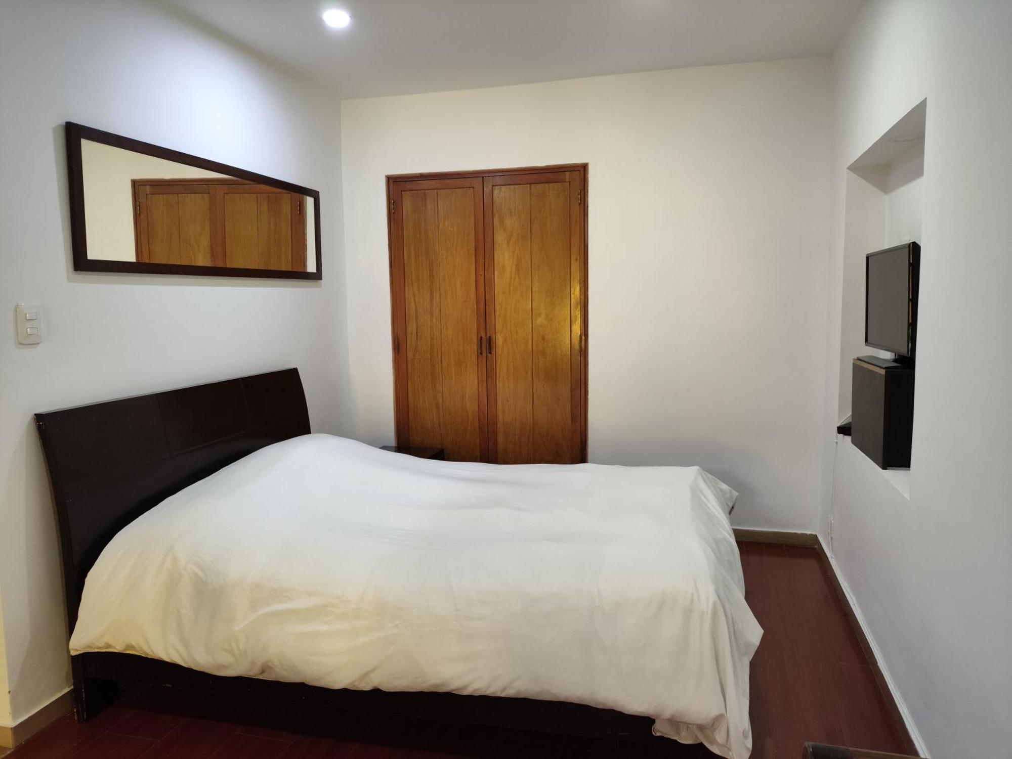 Apartaestudios La Candelaria Богота Номер фото